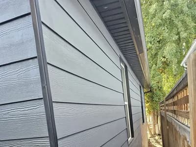 Exterior siding installed with tight seams and clean trim — project 3